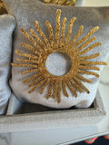 Broche soleil