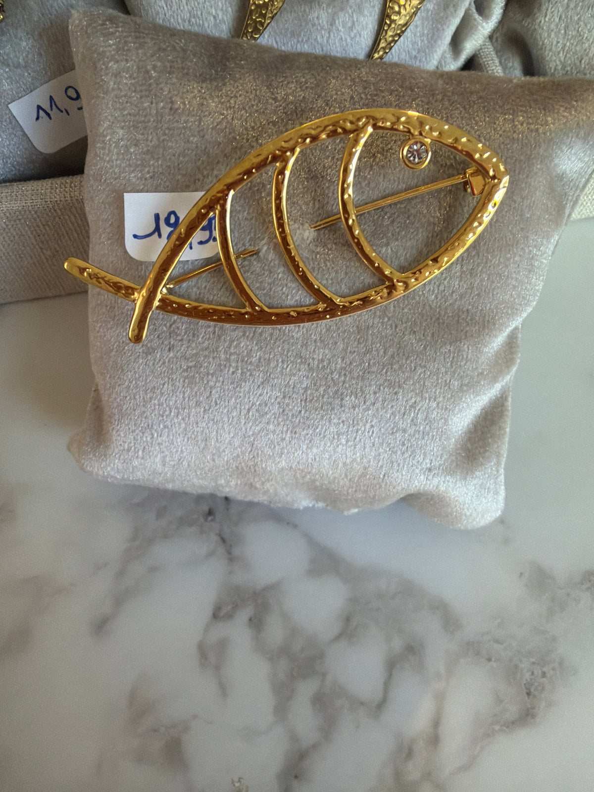 Broche poisson brillant 