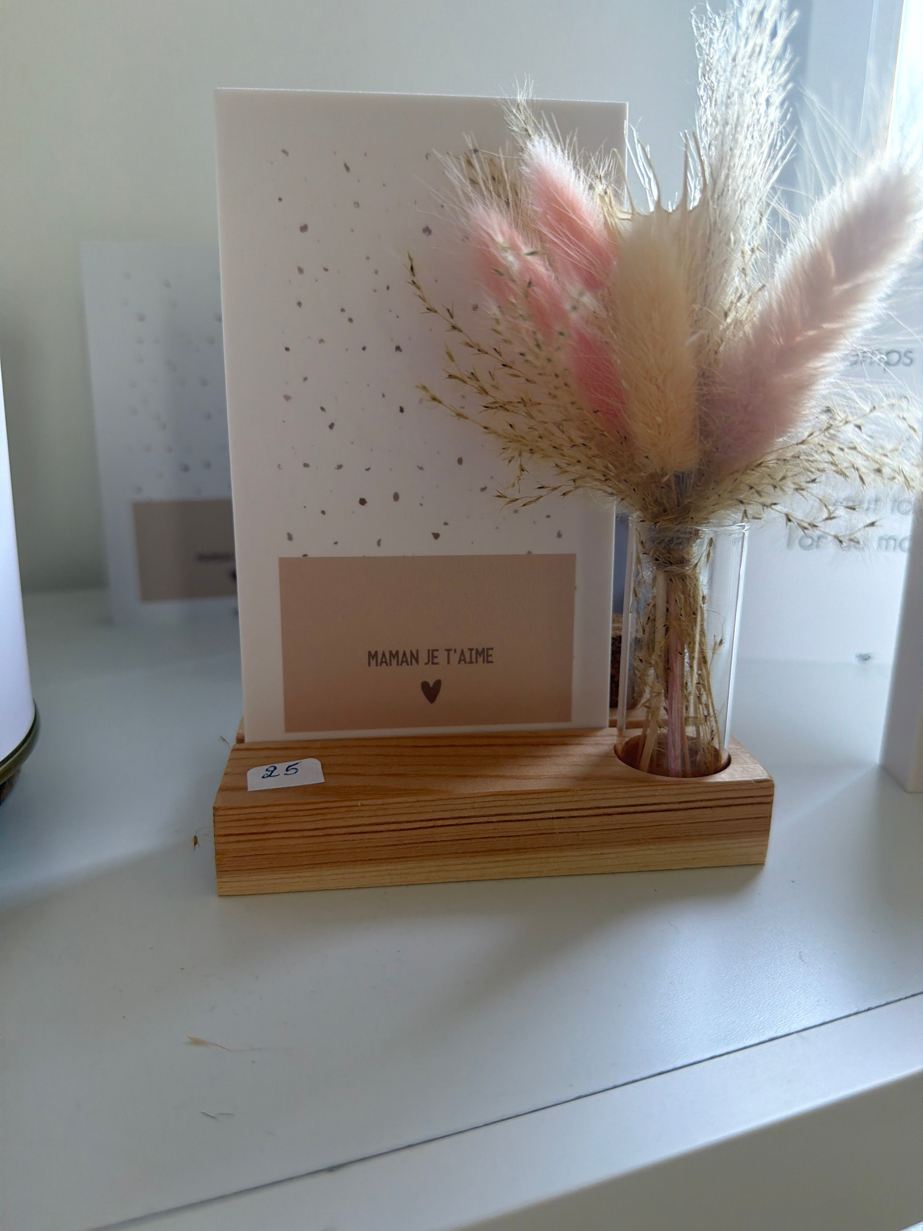 Cadre avec fiole 