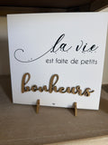 Cadre sur pieds dorés 