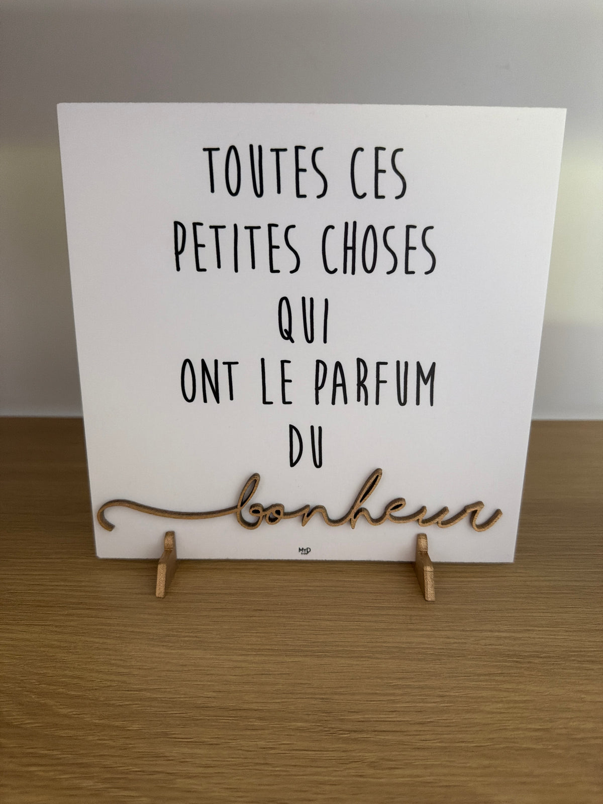 Cadre sur pieds dorés 