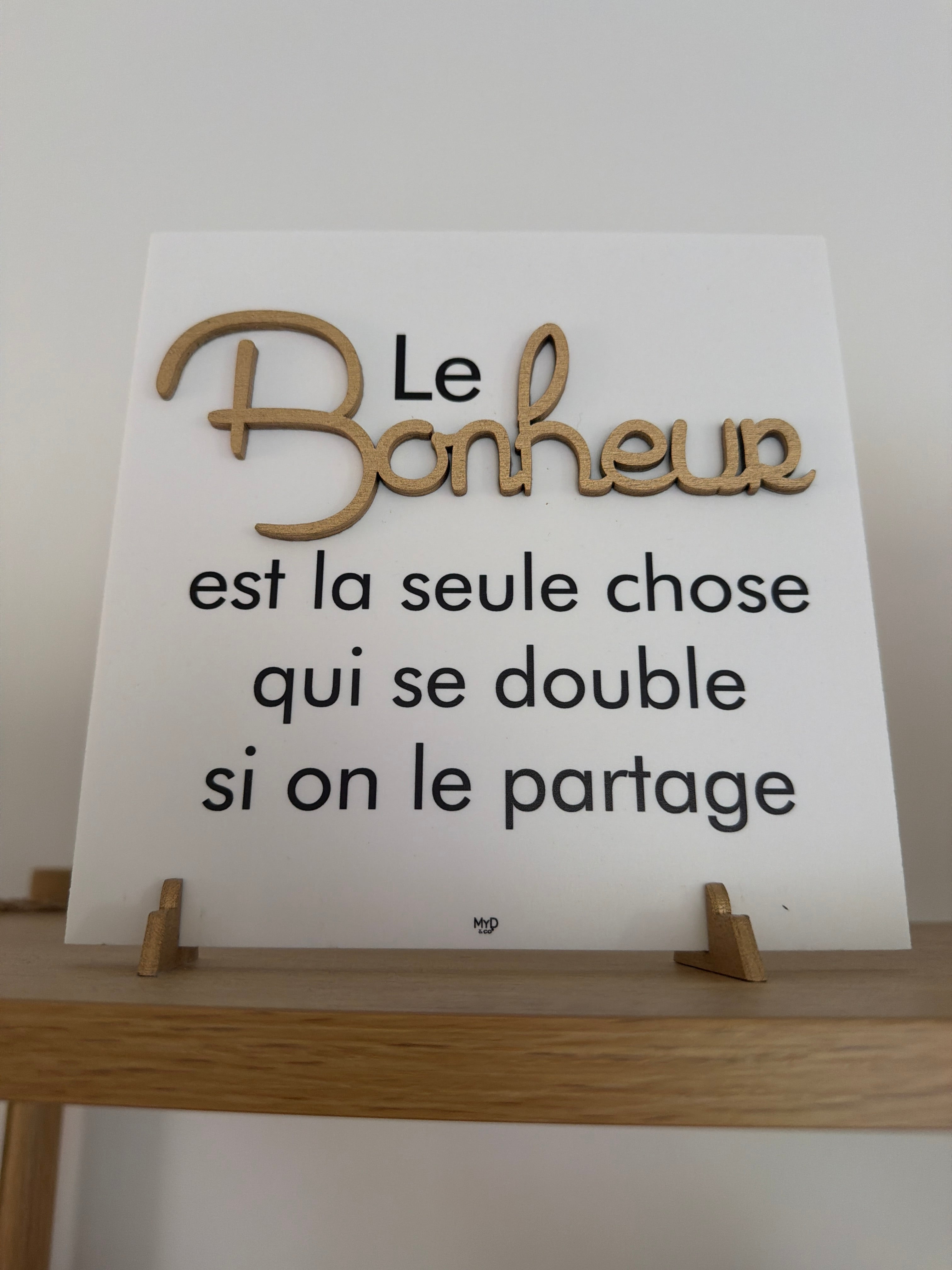 Cadre sur pieds dorés 