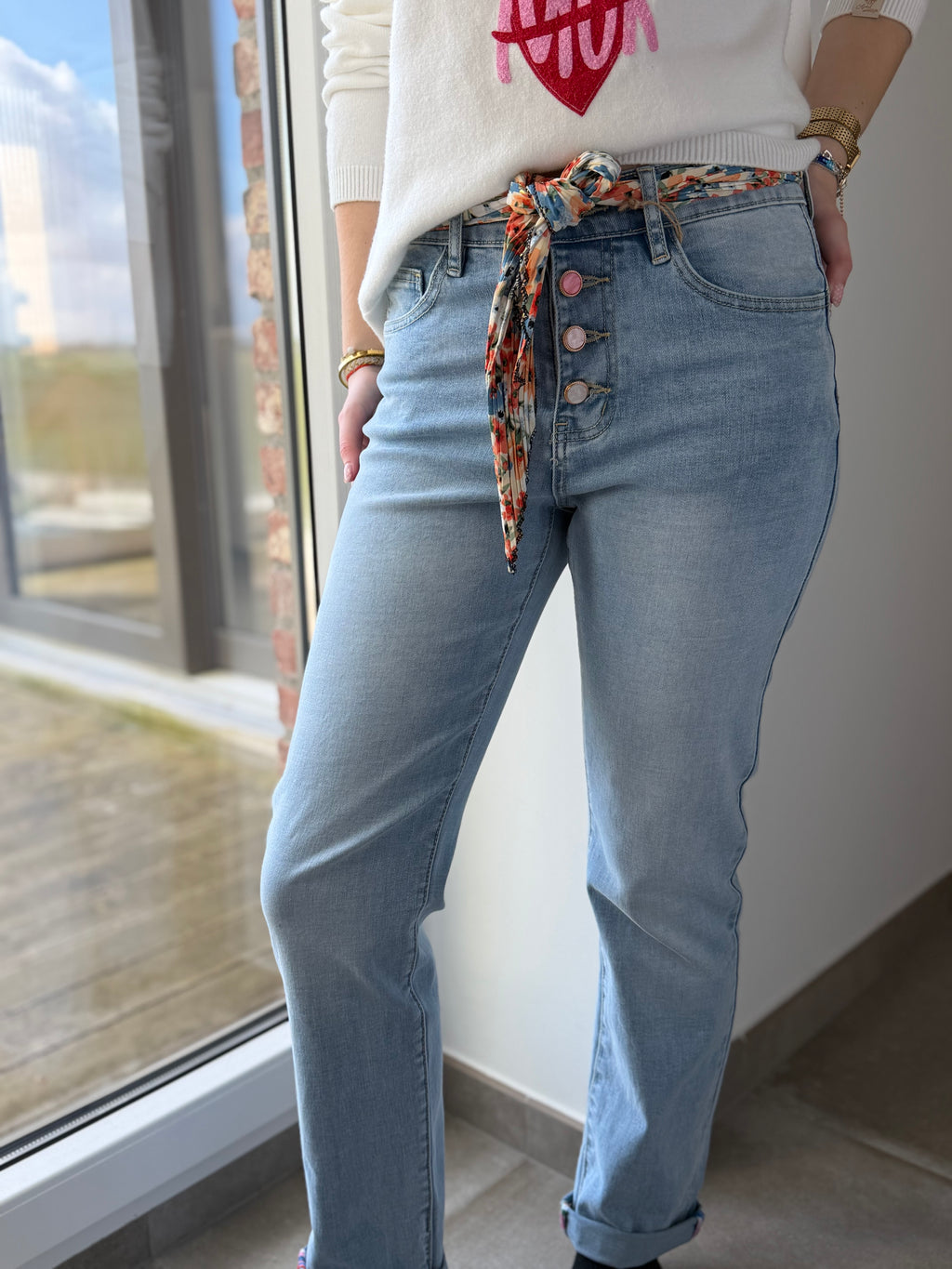 Jeans boutons roses