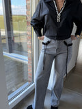 Jeans gris avec rubans noirs 